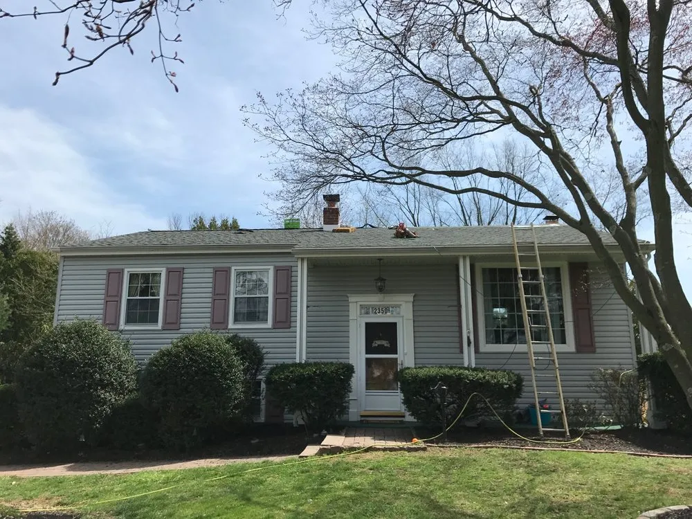 Top-rated storm damage roof repair in Holmes, PA by Green Star Exteriors