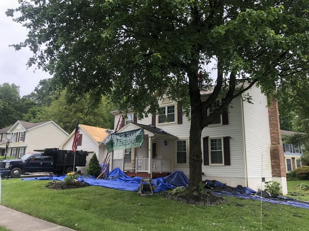 Slide of Greenacre Roofing