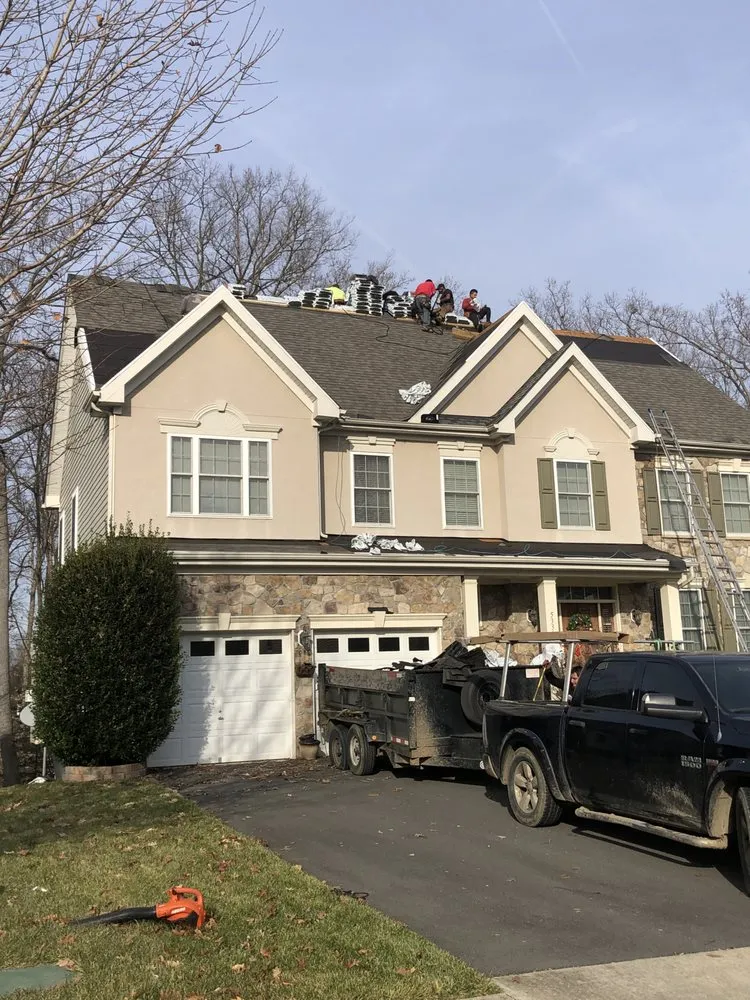 Slide of Greenacre Roofing