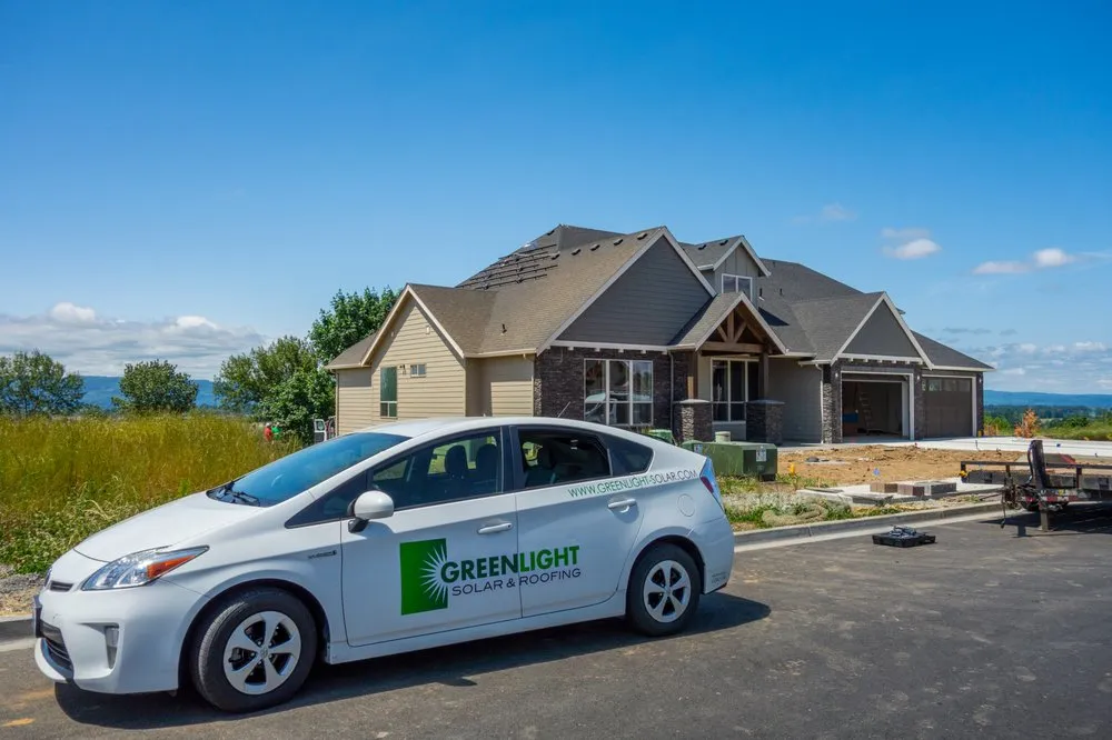 Slide of Greenlight Solar & Roofing