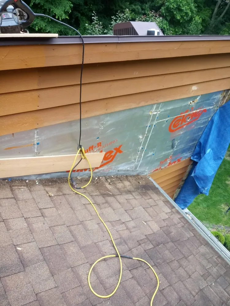 Slide of Greeno's roofing