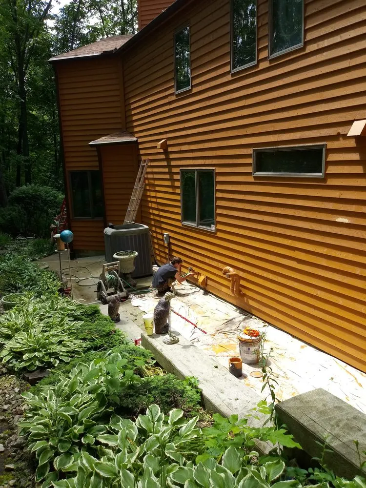 Slide of Greeno's roofing