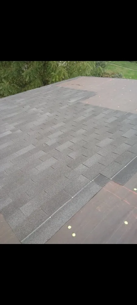 Slide of Greeno's roofing