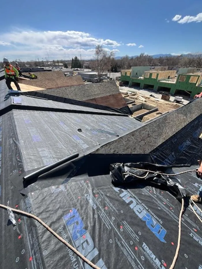 Slide of GreenPoint Roofing