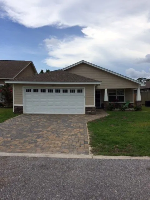 Slide of Greg's Roofing Of Bay County