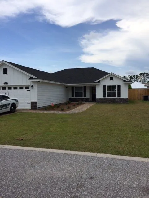 Slide of Greg's Roofing Of Bay County
