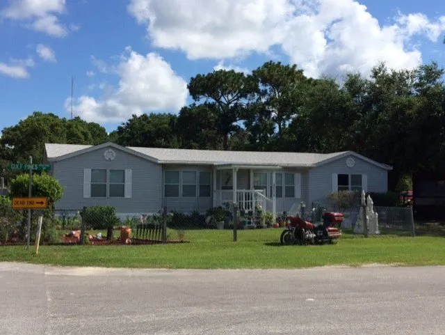 Slide of Greg's Roofing Of Bay County