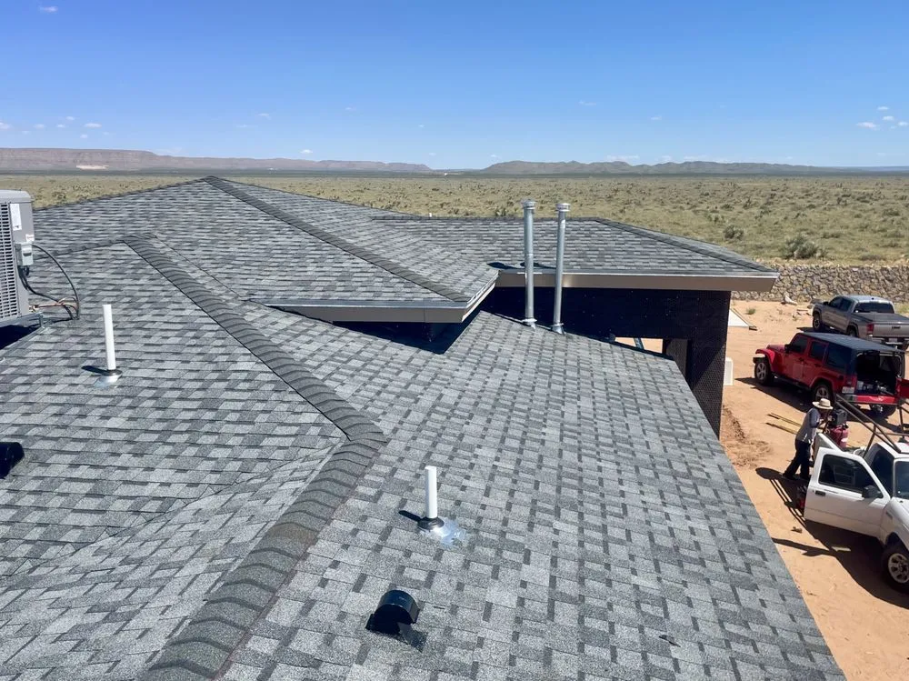 Slide of Grey Bird Roofing