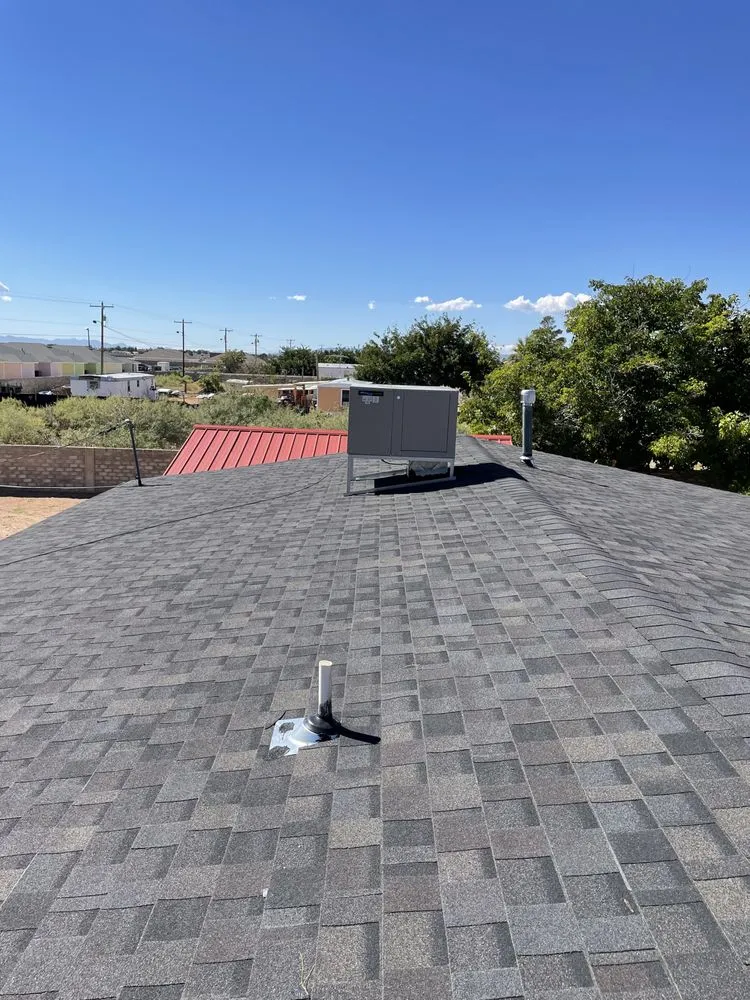 Slide of Grey Bird Roofing