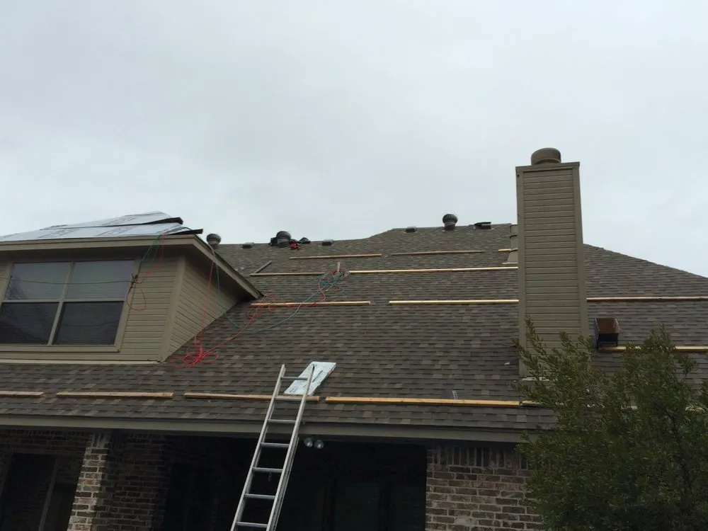 Slide of Greyhawk Roofing