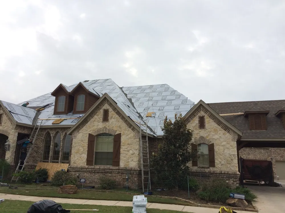 Slide of Greyhawk Roofing