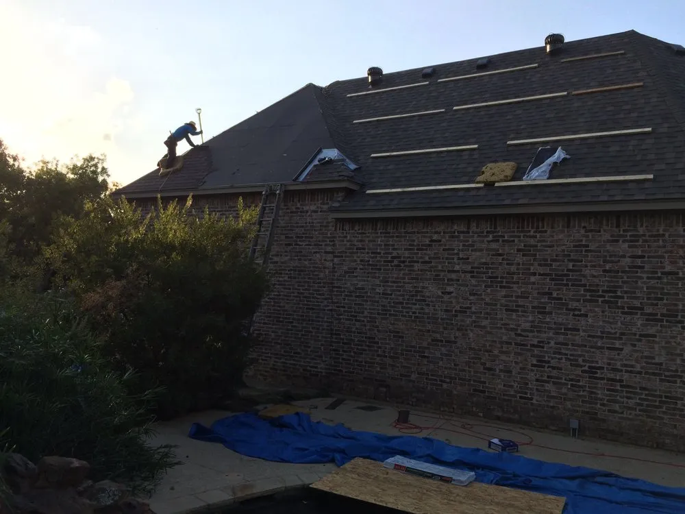 Slide of Greyhawk Roofing