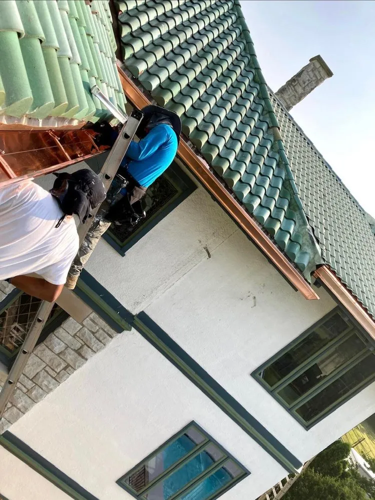 Slide of GreySky Gutters & Roofing