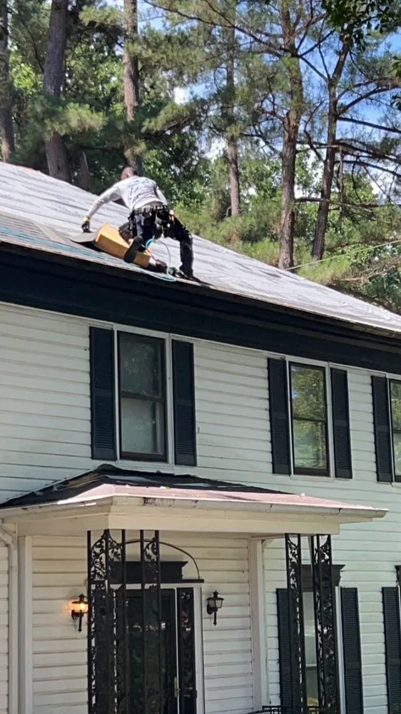 Slide of Griffins Roofing