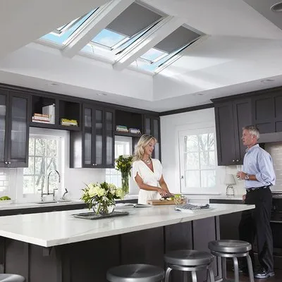 Grim Construction Inc and Skylight Depot Logo