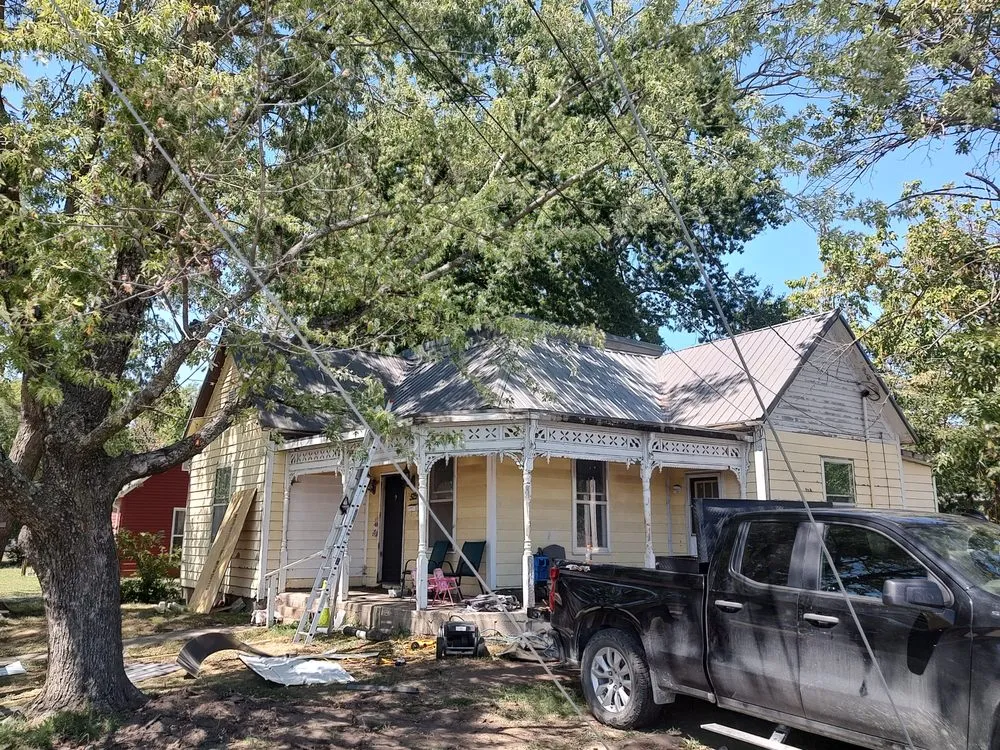 Slide of Grindstone Roofing