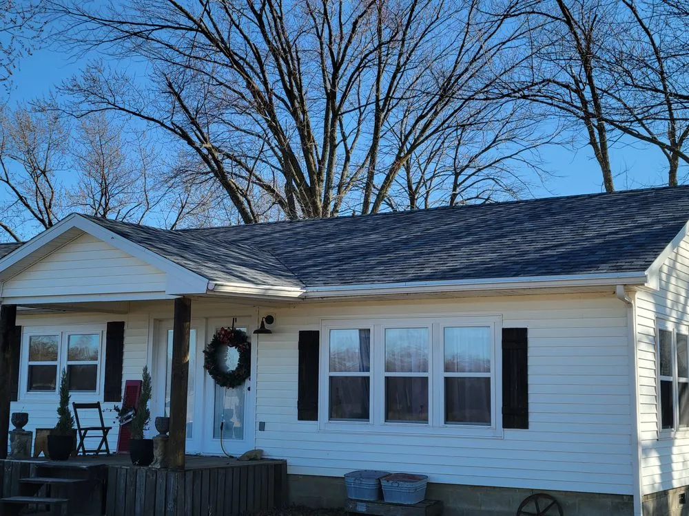 Slide of Grindstone Roofing