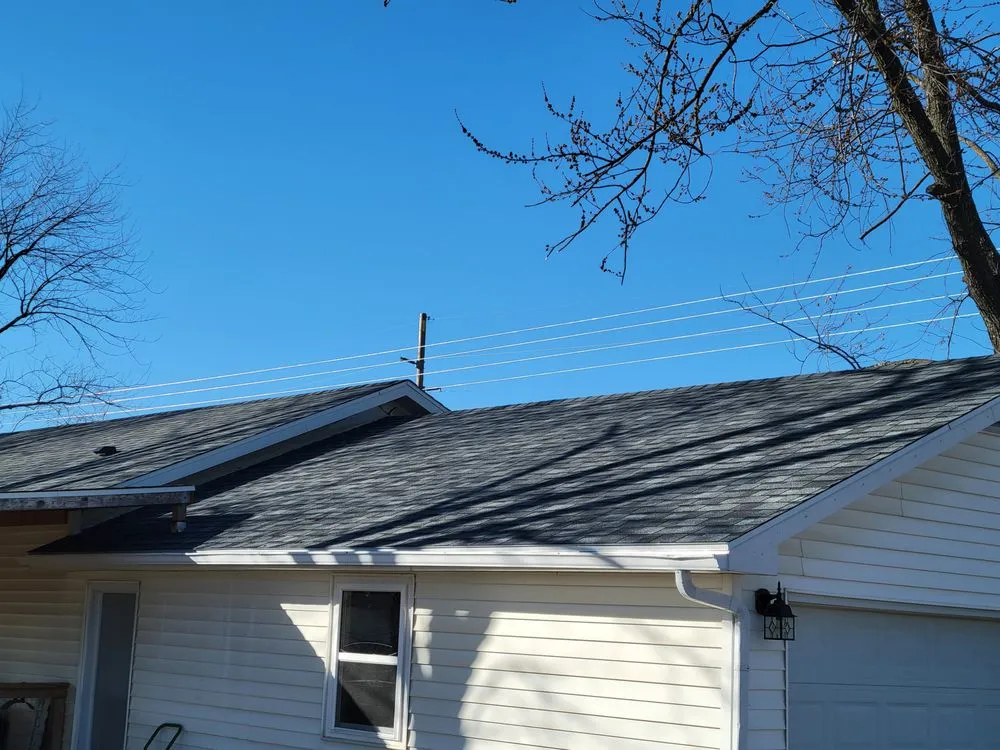 Slide of Grindstone Roofing