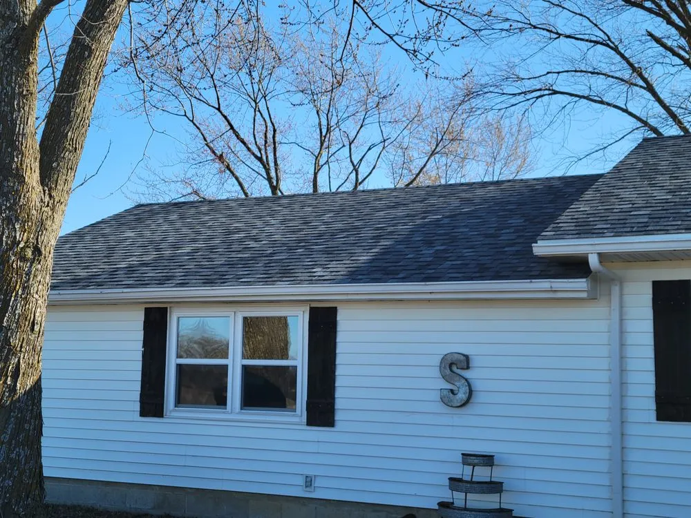 Slide of Grindstone Roofing