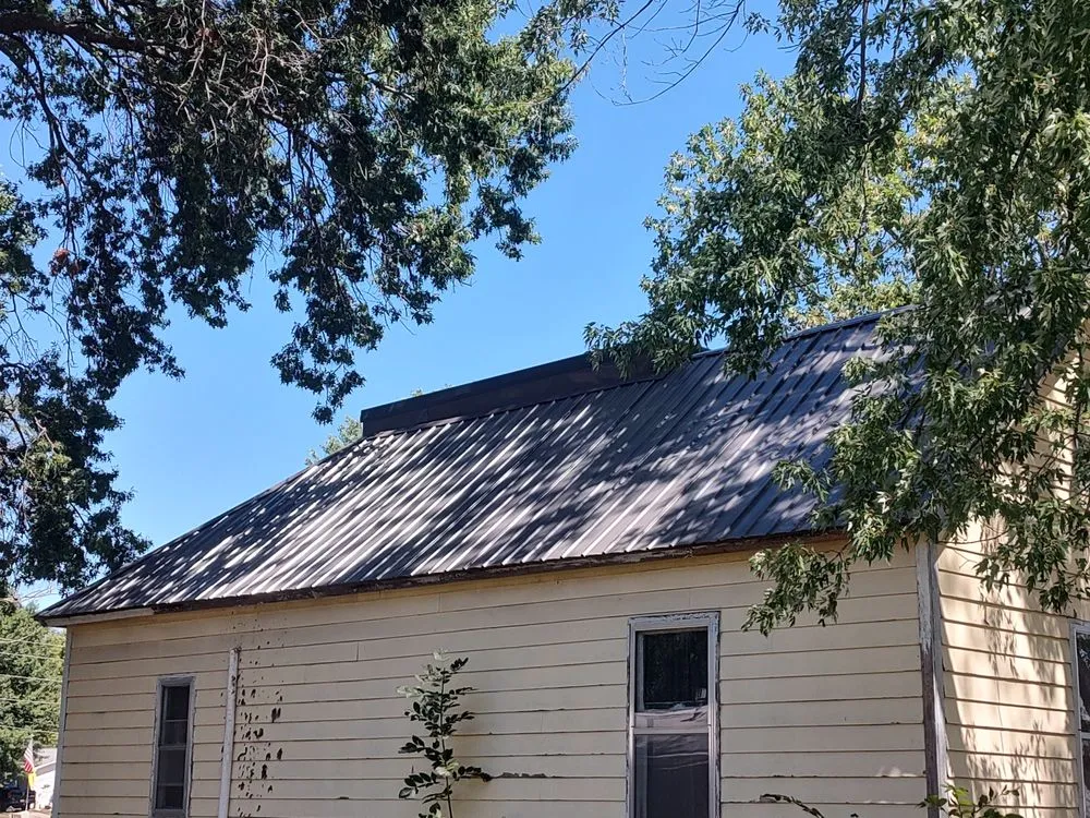 Slide of Grindstone Roofing