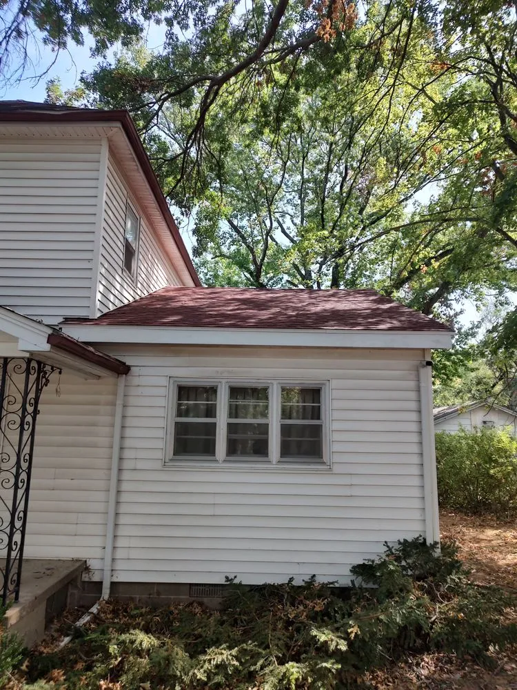 Slide of Grindstone Roofing