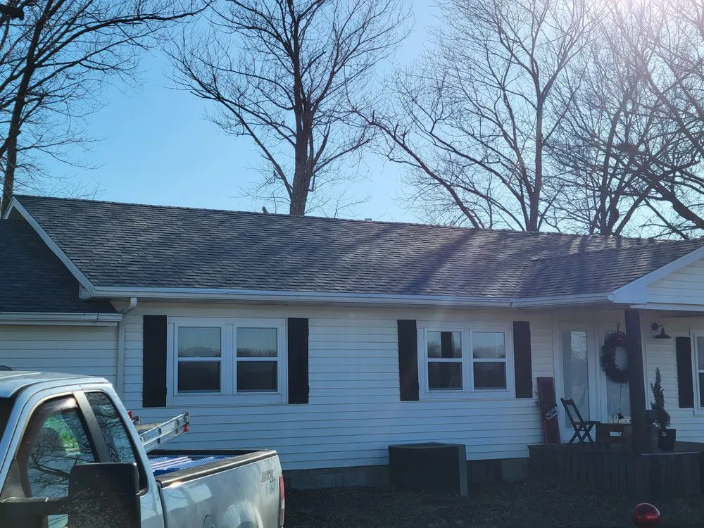 Slide of Grindstone Roofing