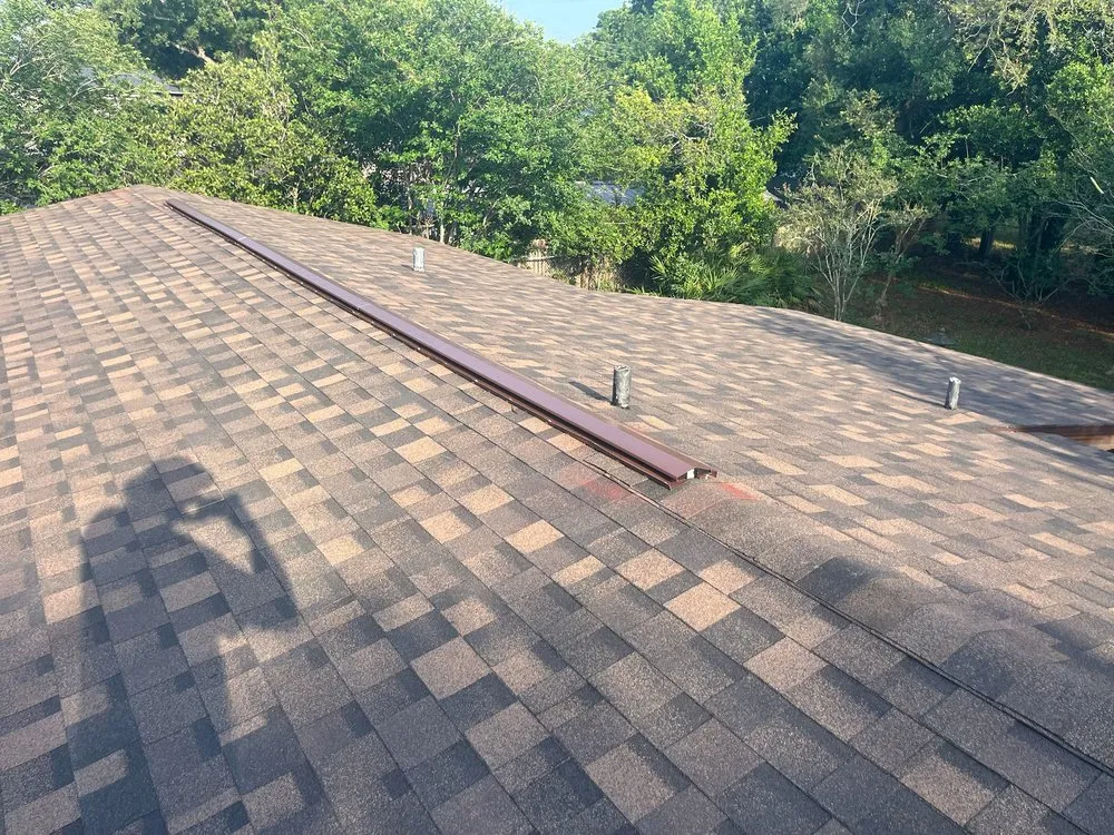 Slide of GRIT Roofing