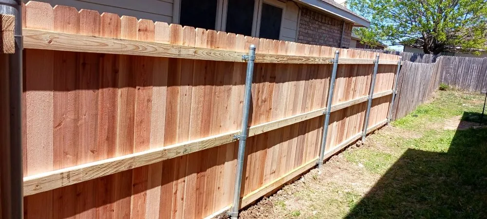 Slide of Grizzly Fence and Patio