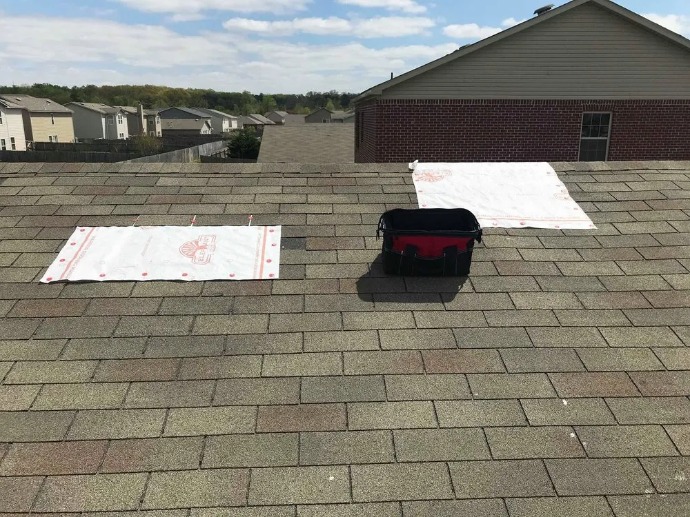 Slide of Grizzly Roofing