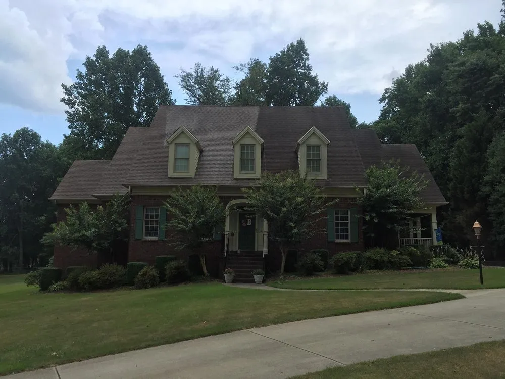 Slide of Grizzly Roofing