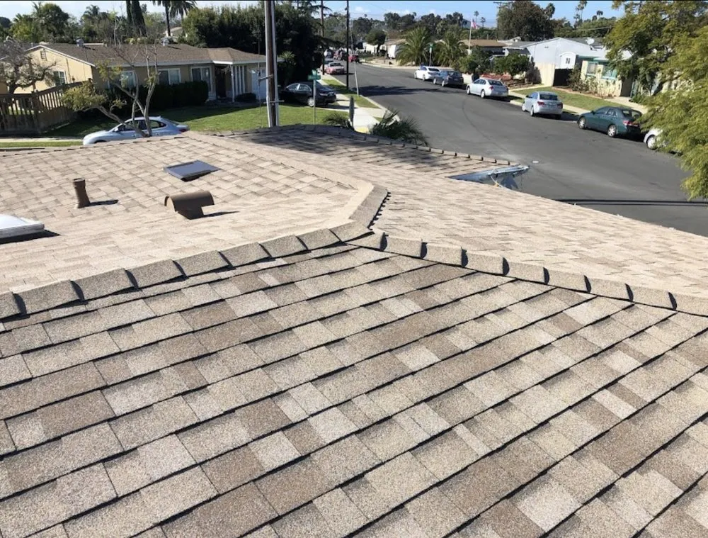 Slide of Grizzly Roofing