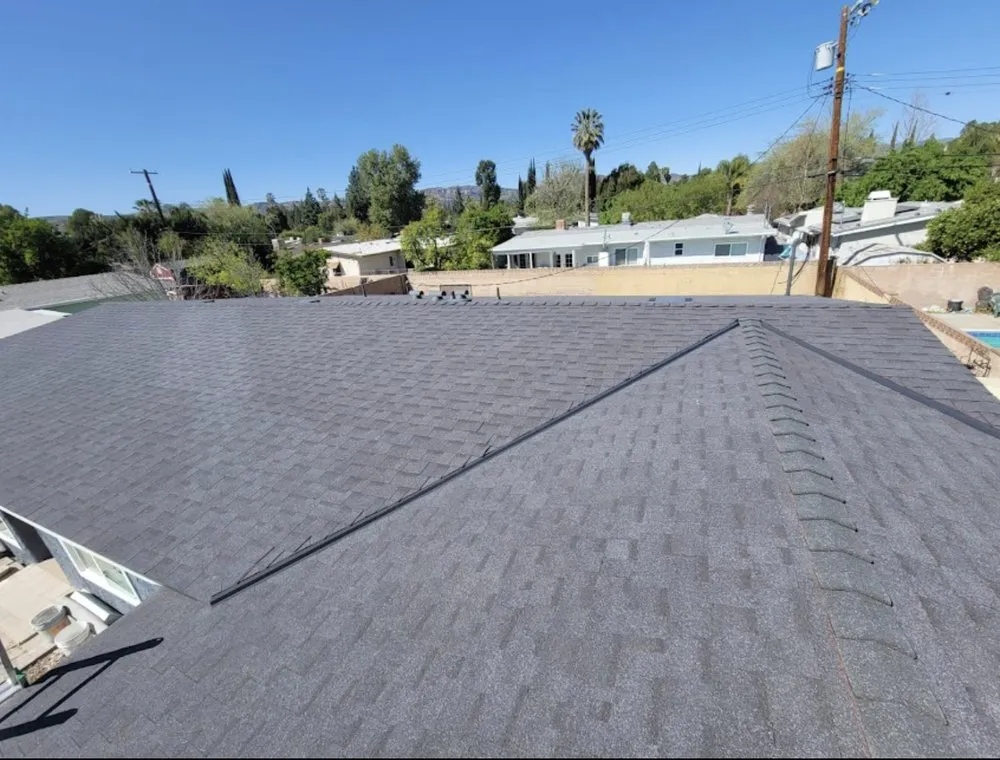 Slide of Grizzly Roofing