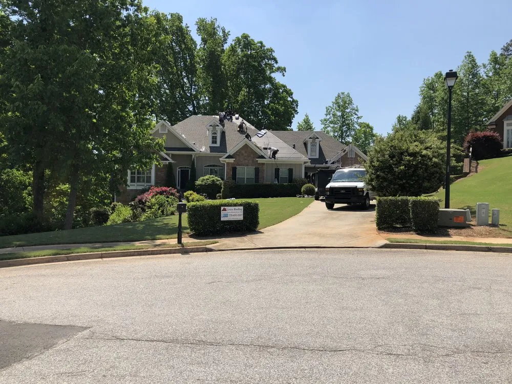 Slide of Grove Roofing