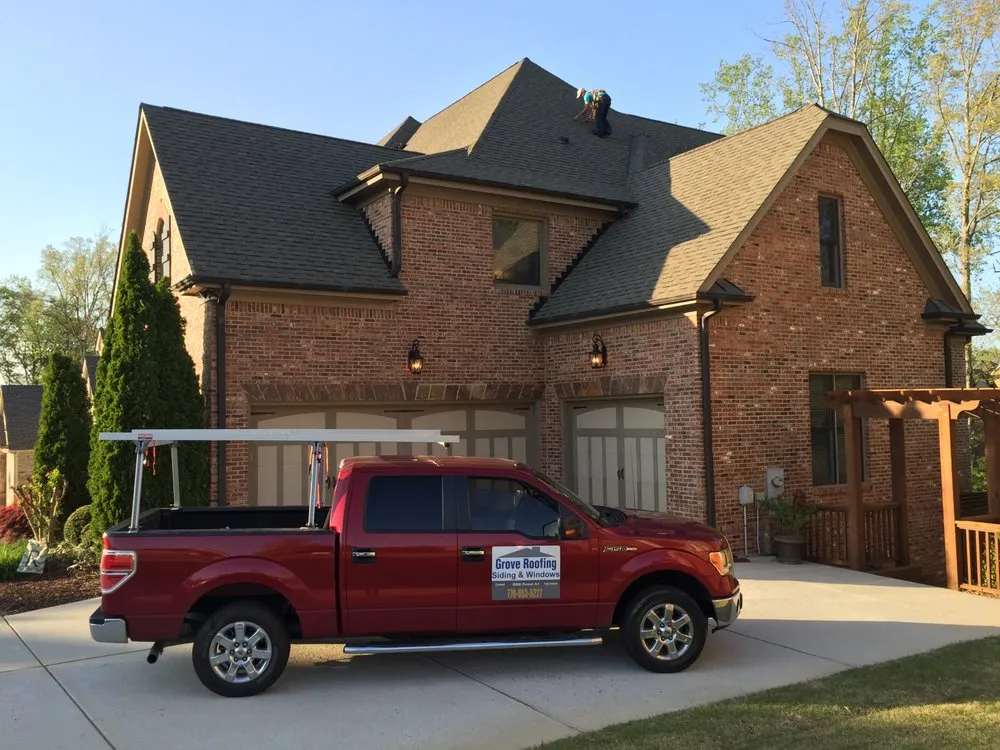 Slide of Grove Roofing