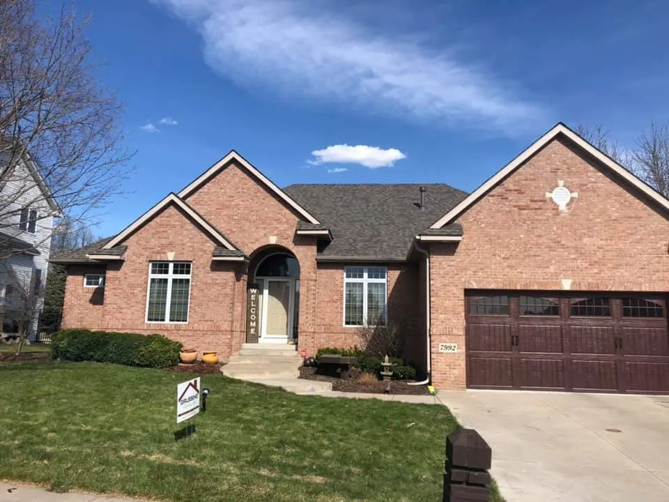 Slide of Grussing Roofing