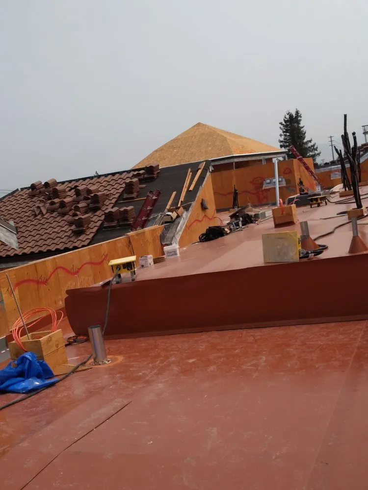 Slide of GT Roofing Services