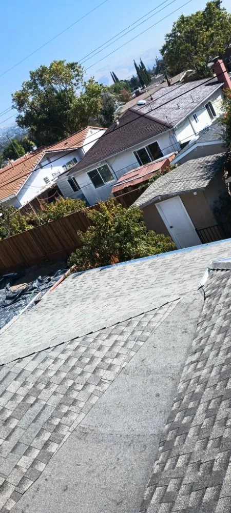 Slide of GT Roofing Services