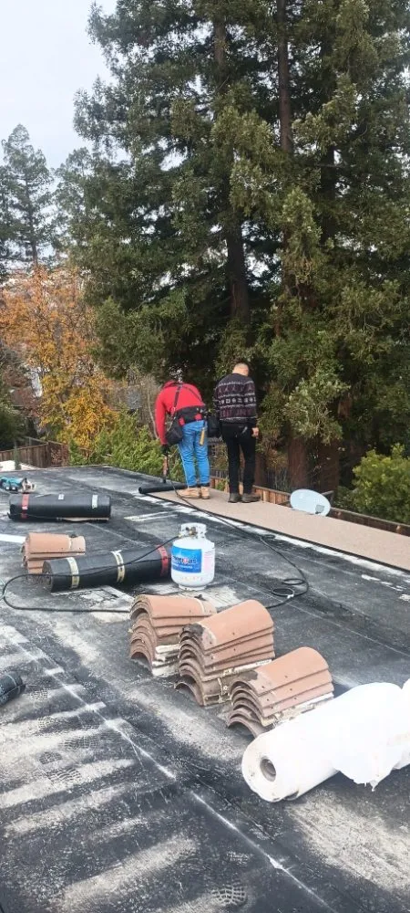 Slide of GT Roofing Services