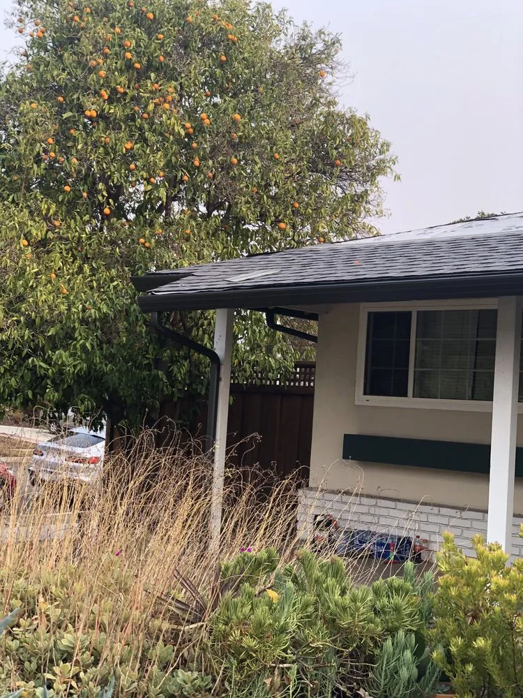 Slide of GT Roofing Services