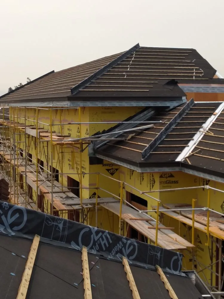 Slide of GT Roofing Services