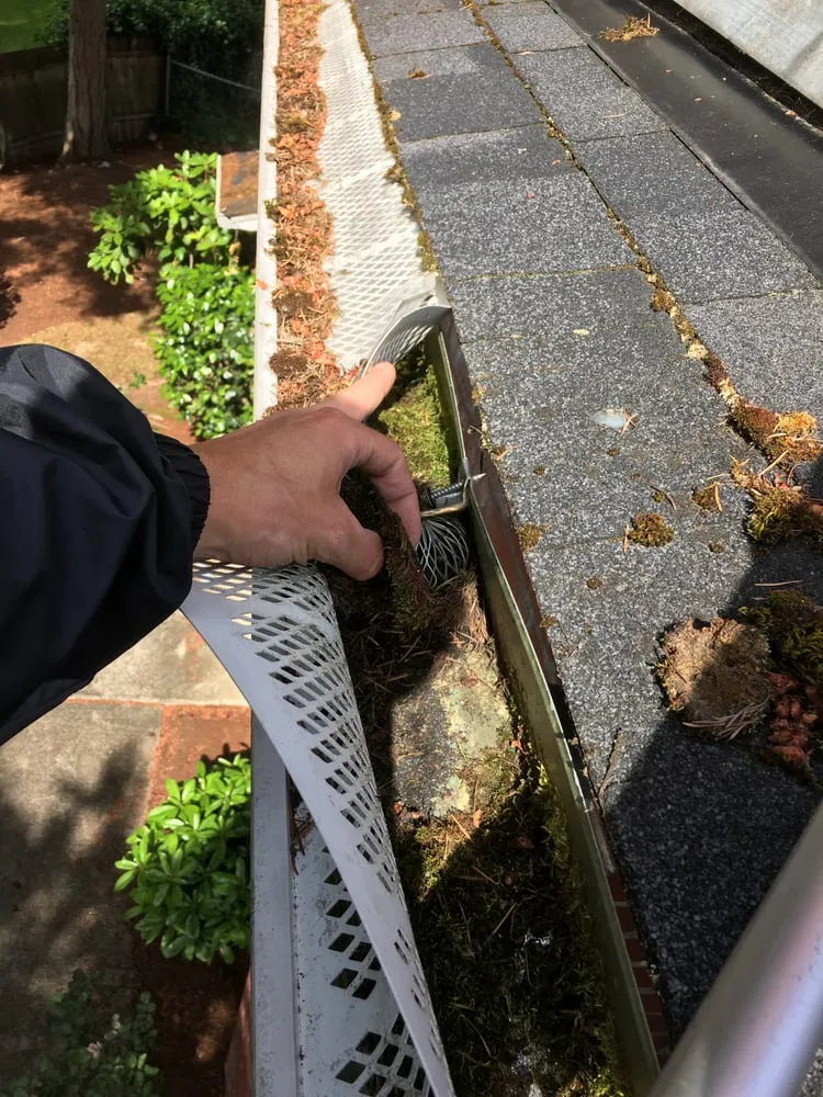 Slide of Gu-Wi Gutters & Windows