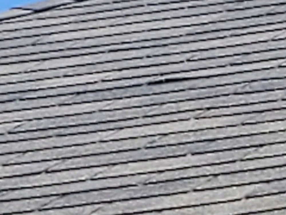 Slide of Guaranteed Roof