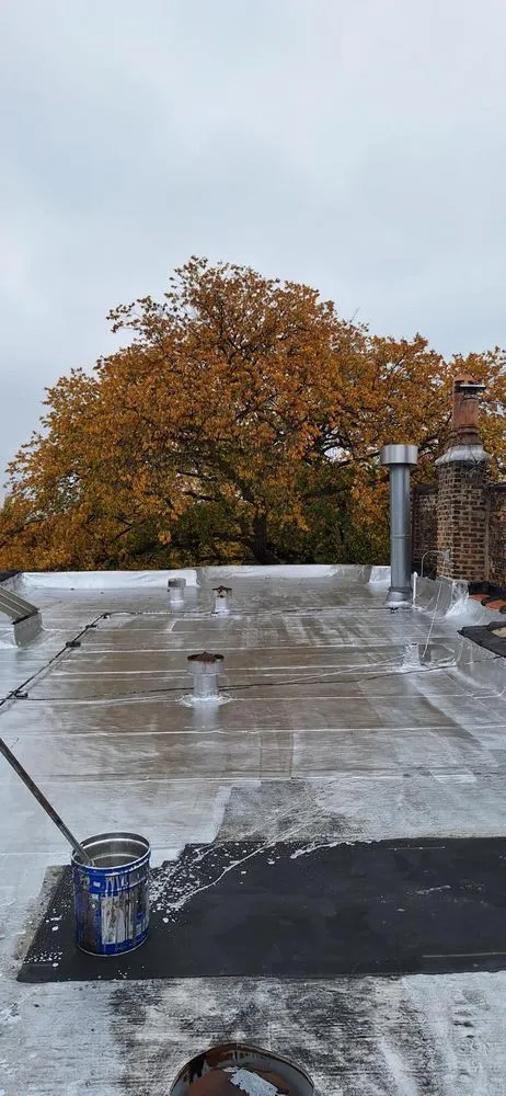 Slide of Guaranteed Roofing & Tuckpointing