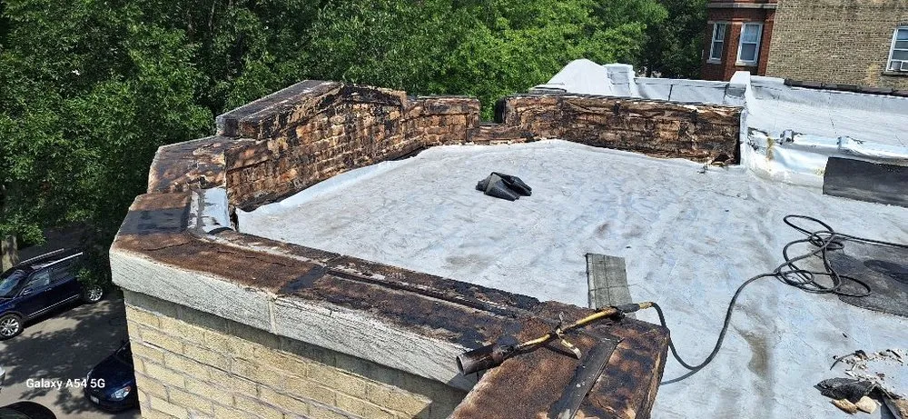 Slide of Guaranteed Roofing & Tuckpointing