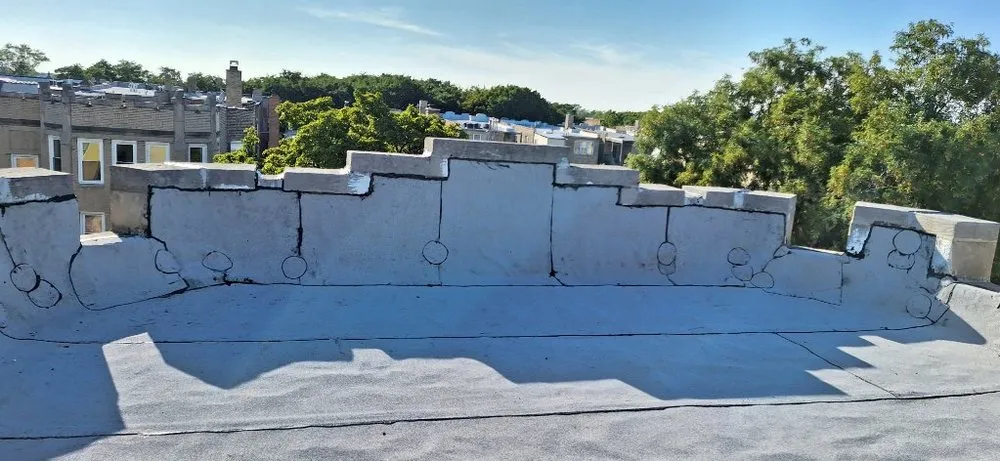 Slide of Guaranteed Roofing & Tuckpointing