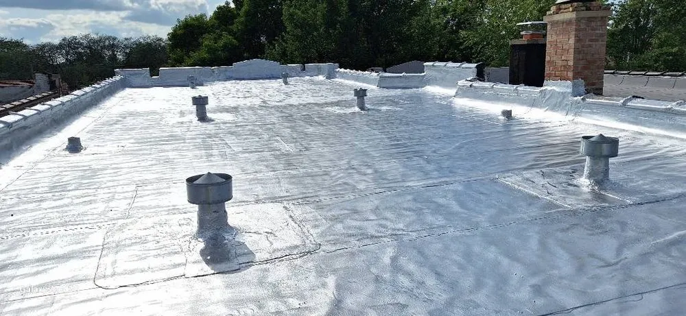 Slide of Guaranteed Roofing & Tuckpointing