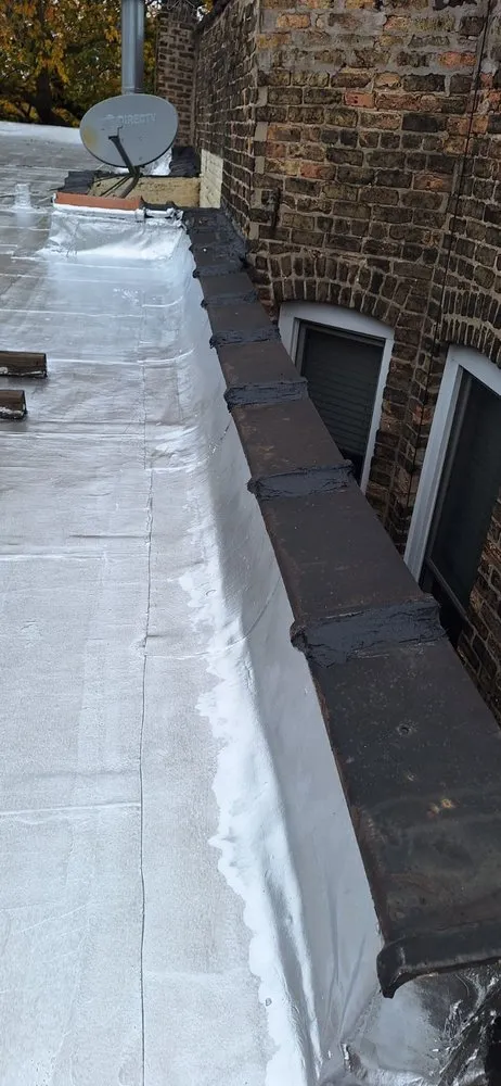 Slide of Guaranteed Roofing & Tuckpointing