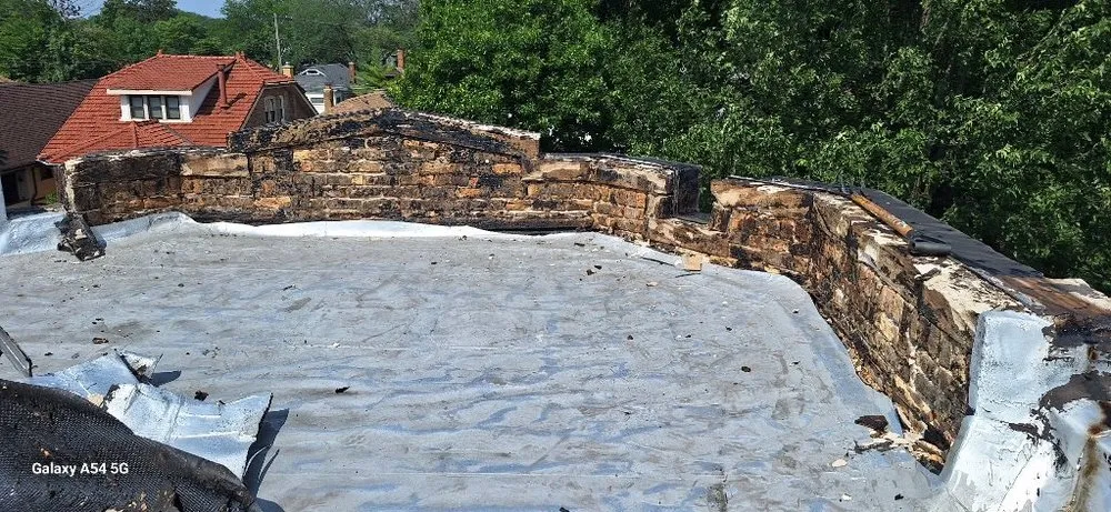 Slide of Guaranteed Roofing & Tuckpointing