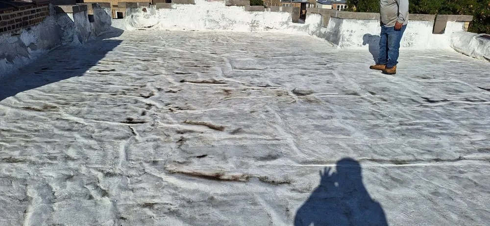 Slide of Guaranteed Roofing & Tuckpointing