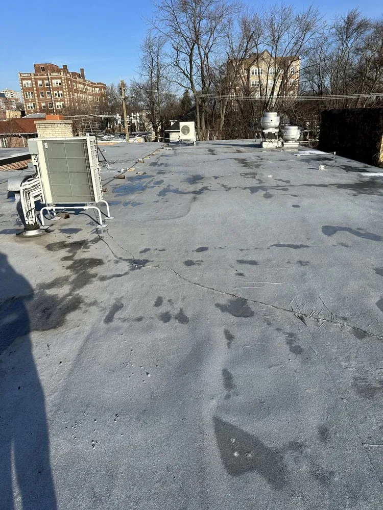 Slide of Guaranteed Roofing & Tuckpointing